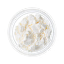 Pure CBN powder in small container. 